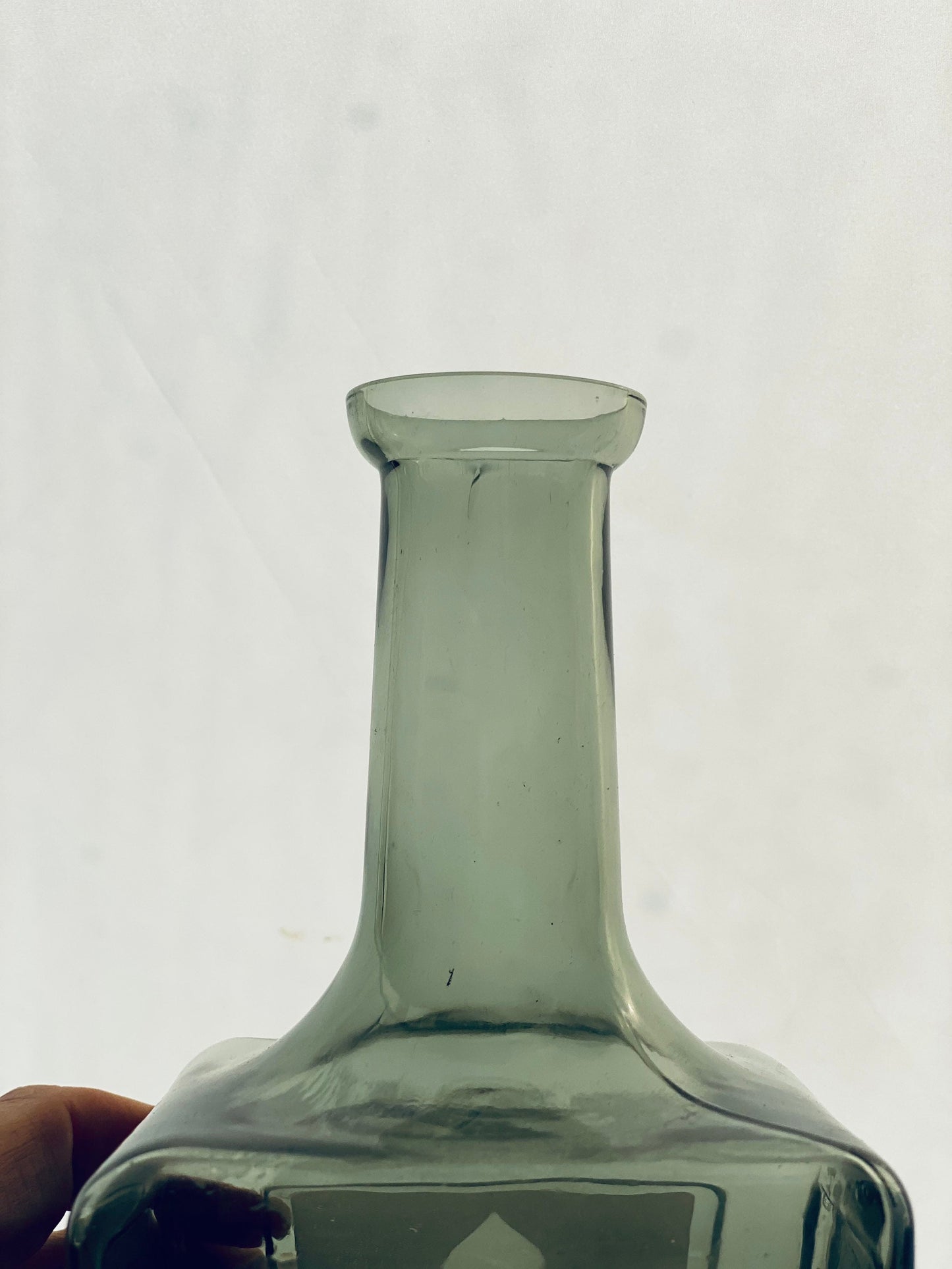 1970s Bass Charrington smoked glass bottle. With frosted ‘Toby Jug’ logo.