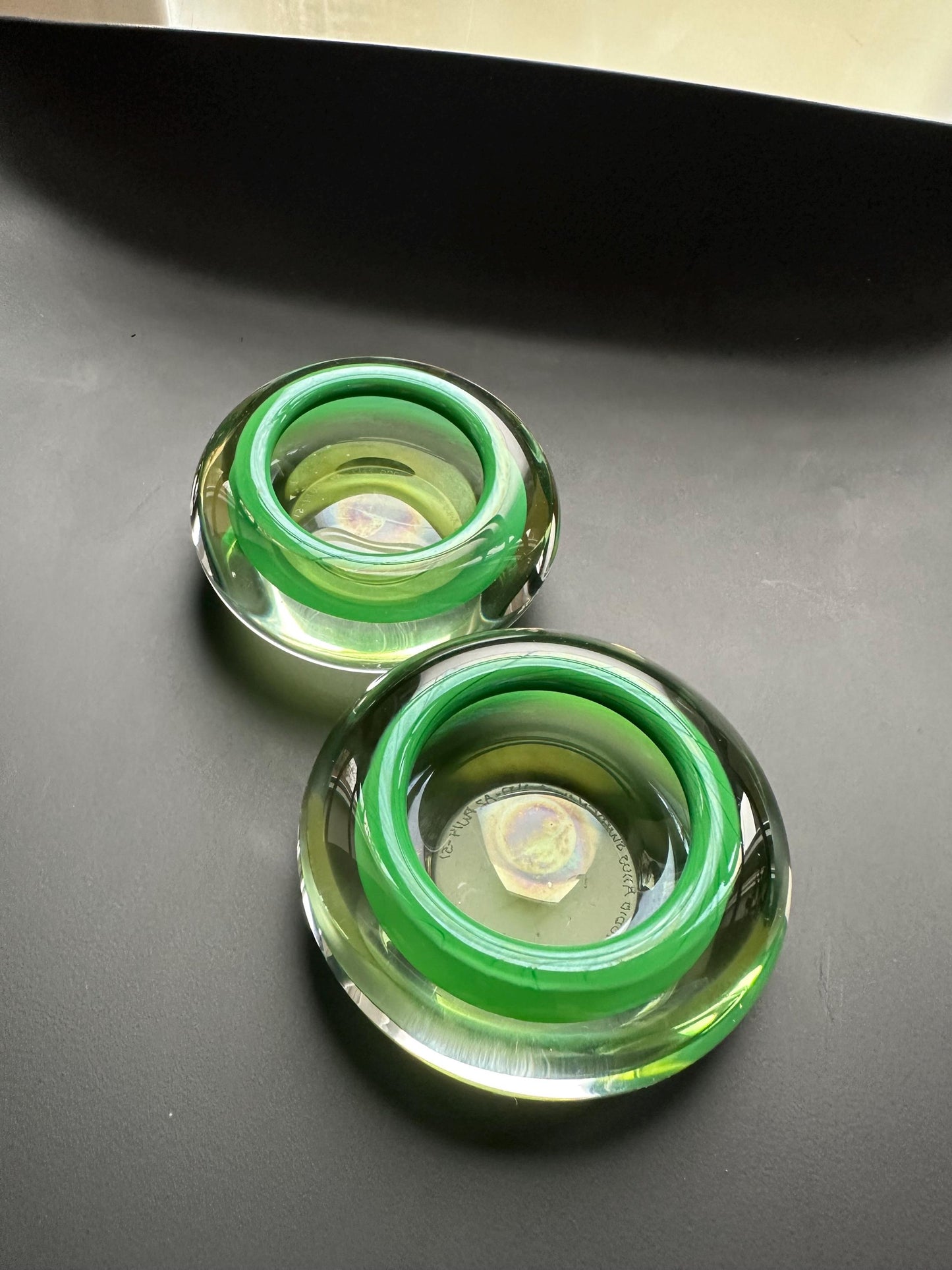 Hanne Dreutler Studio Åhus 2000 signed Swedish studio glass votive holders. Clear cased glass with emerald core, sculptural modern design.