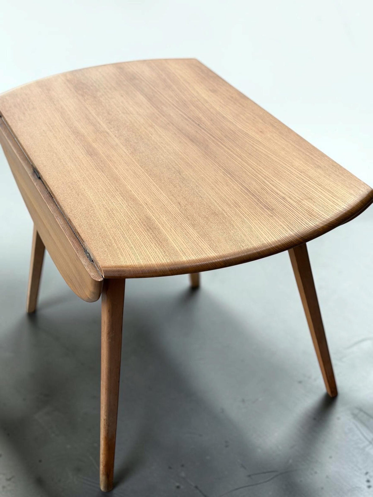 Early 1950s Ercol Elm Drop-Leaf Dining Table | Lucian R. Ercolani