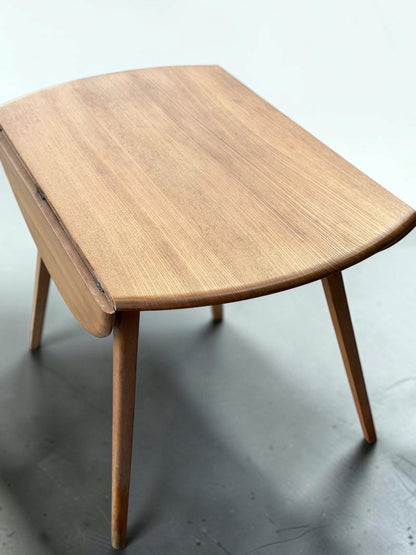 Early 1950s Ercol Elm Drop-Leaf Dining Table | Lucian R. Ercolani