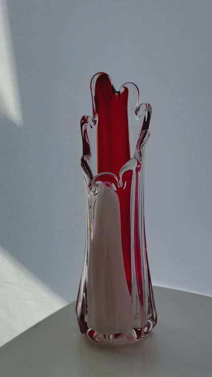 A Murano Art Glass vase, organic form, clear with white, and red tint